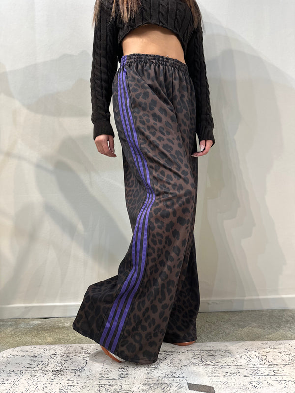 Pantalone maculato bande viola