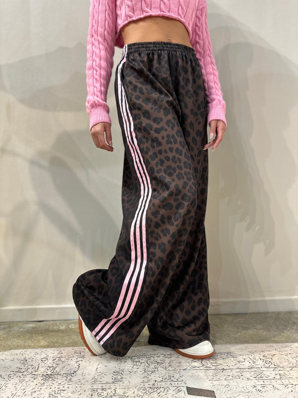 Pantalone maculato bande rosa