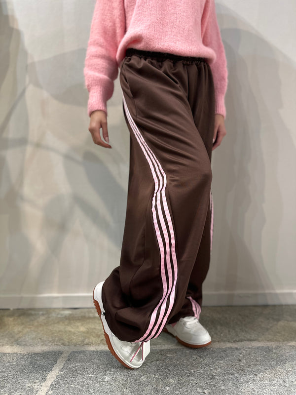 Pantalone balloon bande rosa